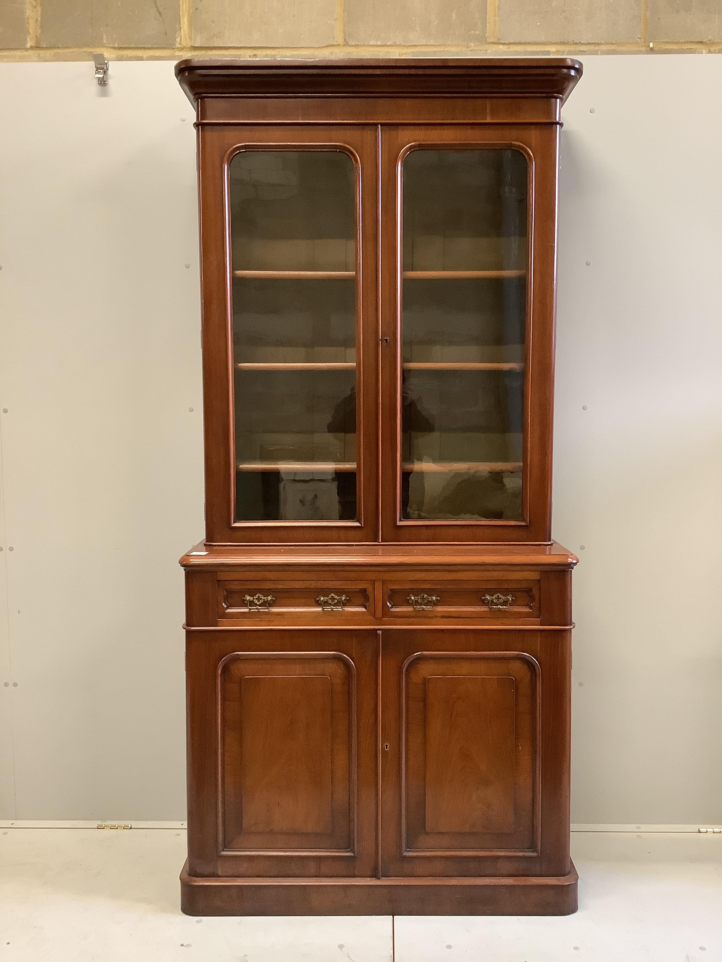 A Victorian mahogany library bookcase, width 104cm, depth 45cm, height 222cm